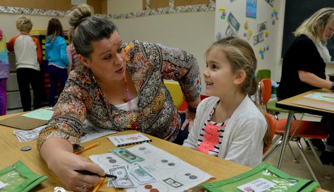 parent volunteer with student