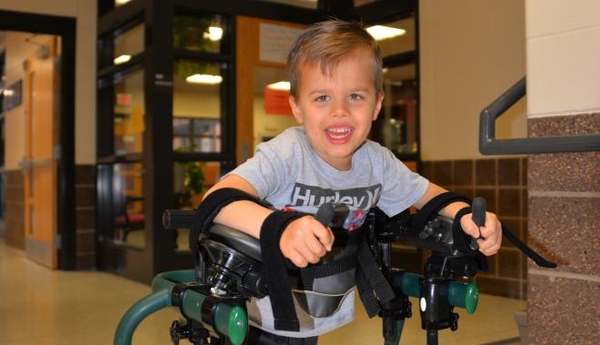 Special needs student walking in the hall