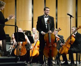 Friesz acknowledges applause after the performance of his piece.